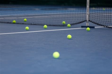 Premium Photo Many Tennis Balls On The Tennis Court