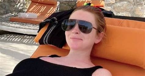 Pregnant Lindsay Lohan Beams As She Shows Off Bump In Swimsuit Ahead Of