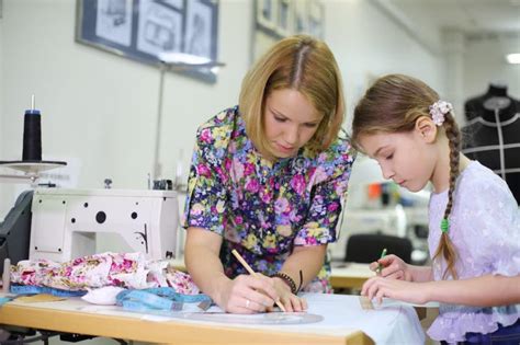 Female Tailor Shows Student Girl How Use of Stock Image - Image of ...