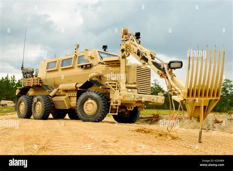 A U.S. Army Buffalo explosive device detection vehicle, assigned to ...