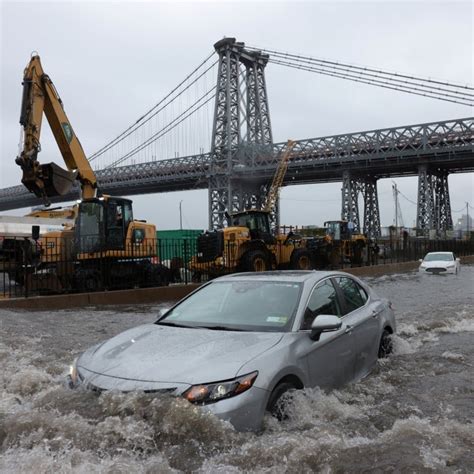 New York under state of emergency after storms flood subways and strand ...