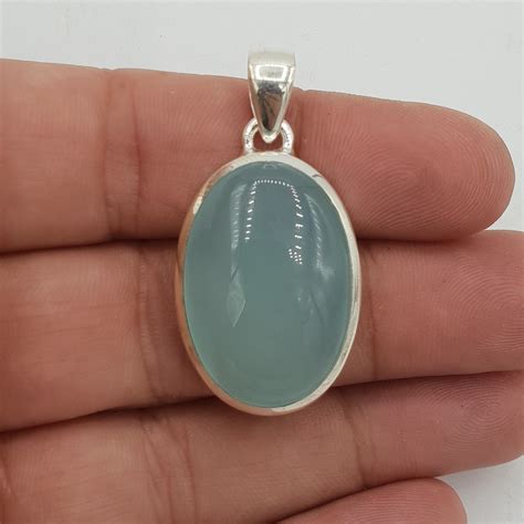 Zilveren Hanger Gezet Met Ovale Cabochon Aqua Chalcedoon Verkocht