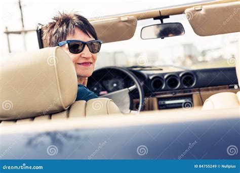 Senior Woman Driving A Convertible Classic Car Stock Image Image Of Daylight Sunlight 84755249