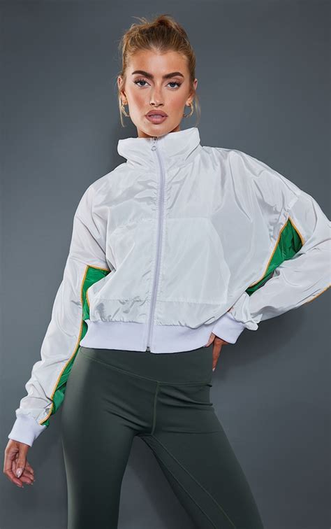 Plt White Graphic Contrast Panel Crop Windbreaker Prettylittlething Usa