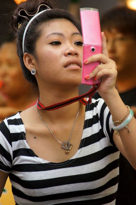 Girl With Pink Cell Girl At A Kaohsiung Night Market Taiw Joseph