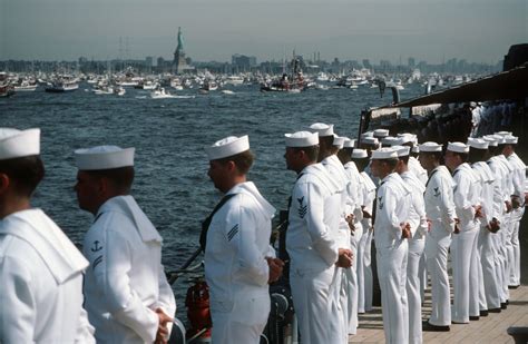 Crew Members Man The Rail Aboard The Battleship Uss Iowa Bb During