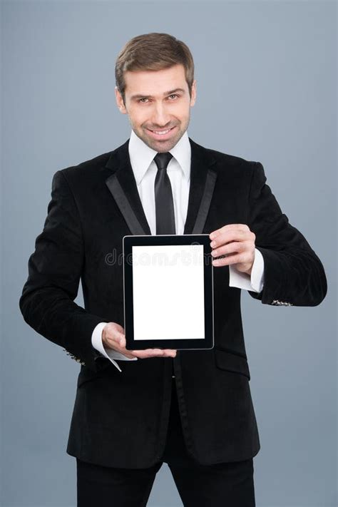 Smiling Businessman Holding Digital Tablet Pc With Blank Screen Stock