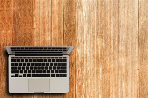 Premium Photo Laptop Computer On Wood Table Top View