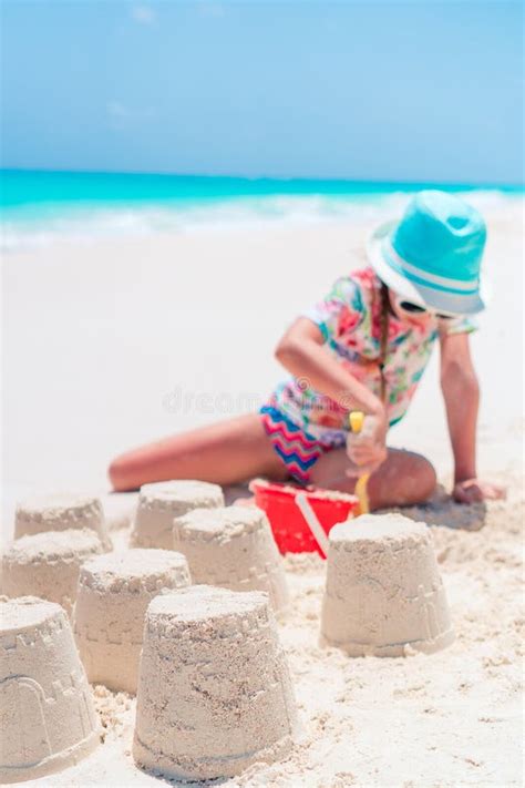 Adorable Little Girl Playing with Beach Toys during Tropical Vacation ...