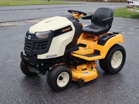 Cub Cadet Gtx Riding Mower With Bagger Snow Blade And Chains