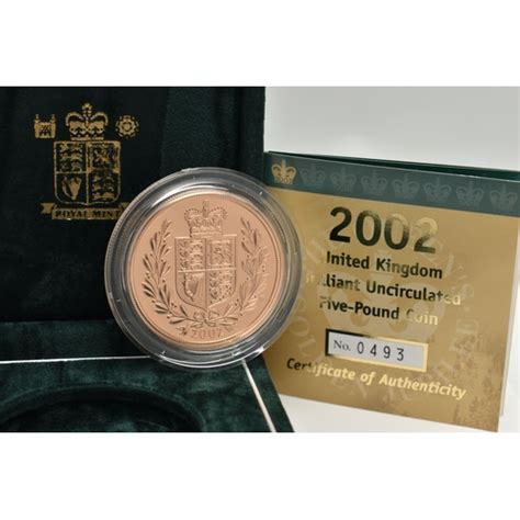 A BOXED ROYAL MINT BRILLIANT UNCIRCULATED 2002 GOLD FIVE POUND COIN