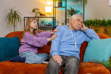 Loving Worried Kind Girl Granddaughter Consoling Sad Crying Grandfather