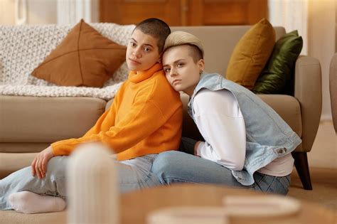 Premium Photo Romantic Lesbian Woman Couple Portrait Over Cozy Home Living Room Background