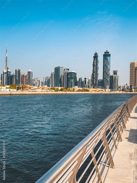 Dubai Water Canal Tolerance Bridge, pedestrian bridge with water taxi ...