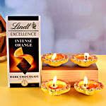 Set Of Traditional Diyas And Lindt Orange Intense Dark Switzerland