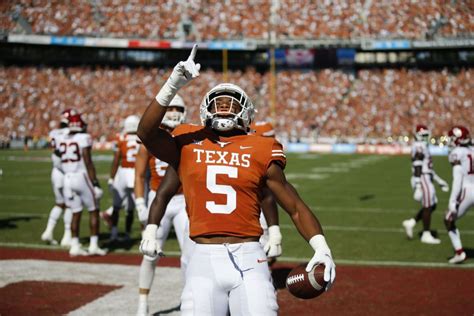 Texas RB Bijan Robinson Signs Massive NIL Deal Lamborghini - Daily Snark