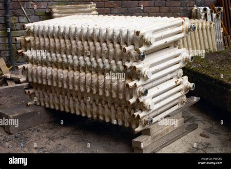 Cast Iron Radiators In Salvage Yard Stock Photo Alamy