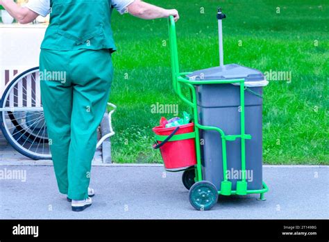 The Janitor Is Working The Janitor With Cleaning Items Sanitation