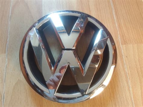 VW TIGUAN PASSAT GOLF EMBLEMAT ZNACZEK 561853600 13246471858