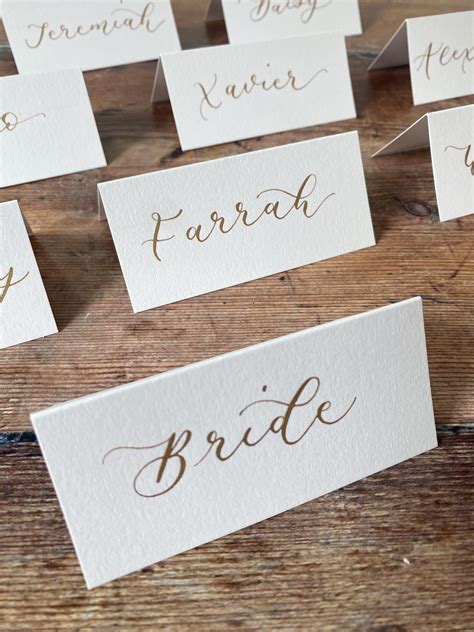 Guest Names Are Hand Lettered With A Beautiful Modern Calligraphy