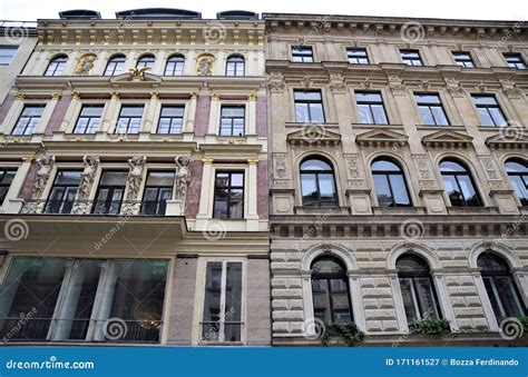 Two Facades Of Important And Historic Buildings Side By Side But With