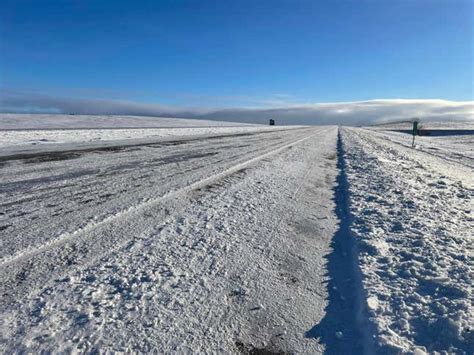 Winter Storm Diaz Buries Big Rigs In Snow In South Dakota