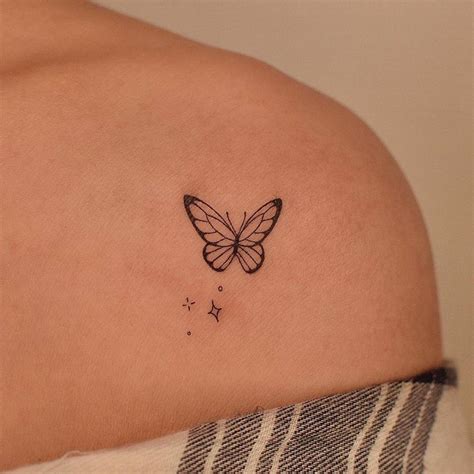 Fine Line Butterfly Tattoo On The Shoulder