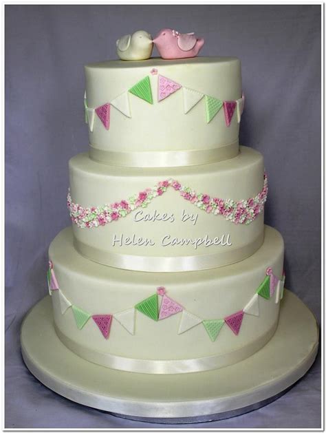 Bunting, and flowers wedding cake - Decorated Cake by - CakesDecor