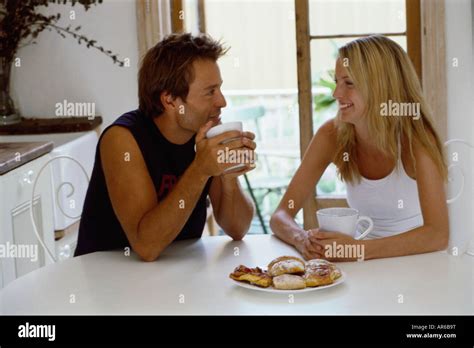Couple Having Hot Drink Stock Photo Alamy