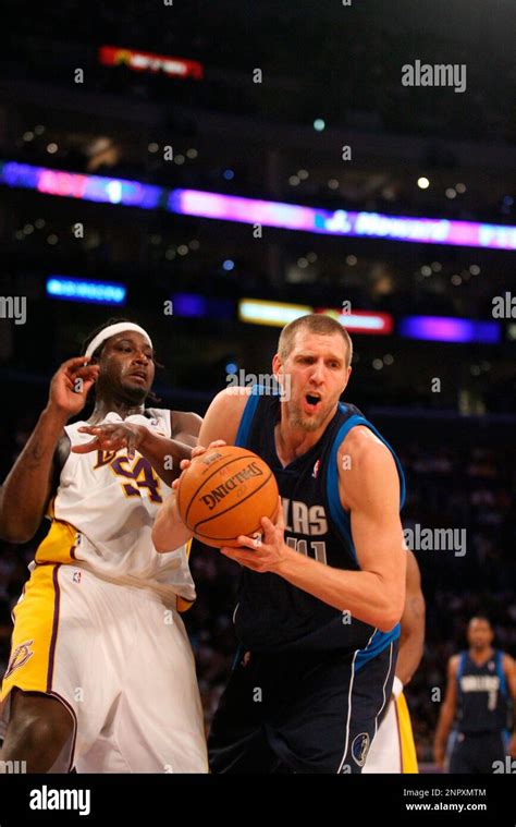 Dallas Mavericks Forward Dirk Nowitzki 41 Makes A Move With The Basketball Against The Los