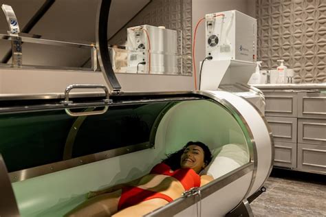 Premium Photo Woman Lying In Oxygen Capsule