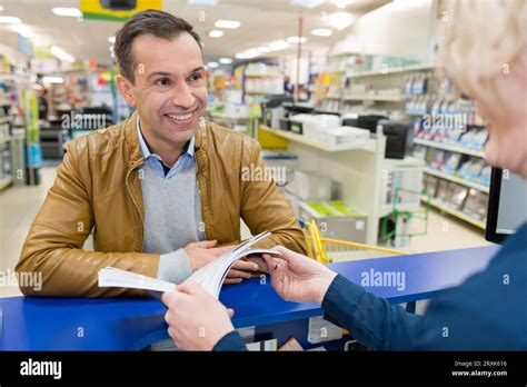 Man Buying Something In A Store Stock Photo Alamy