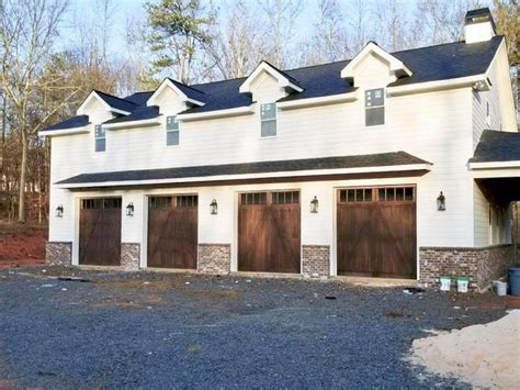 Wood Carriage House Garage Doors - Farmhouse - Garage - Atlanta - by Aaron Overhead Doors