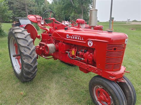 RESTORED TRACTORS, FARM MACHINERY, FIREARMS, ANTIQUES & SHOP MISC