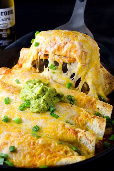 Spicy Chicken Enchiladas Made In A Cast Iron Skillet With Seasoned