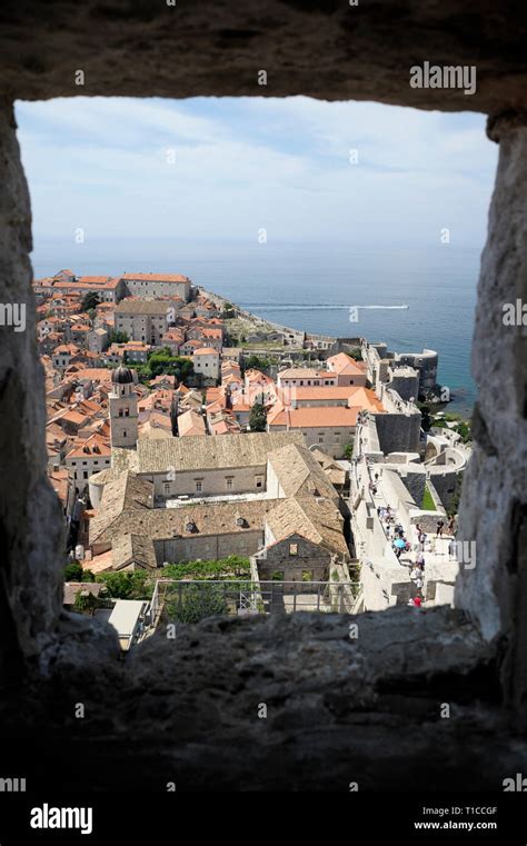 View Through Lookout Window Over Dubrovnik Old Town And Dominican