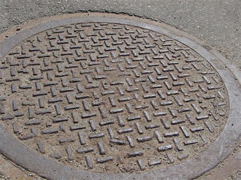 Man Hole Cover Images Of Tires Cars Roads Signage And Flickr