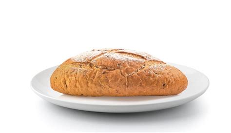 Premium Photo Close Up Of Bread In Plate Against White Background