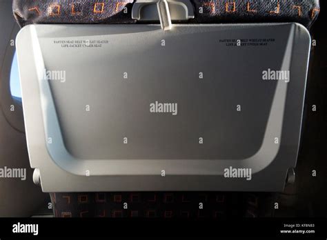 Passenger Seat Tray Table In The Full Upright Position On An Airbus