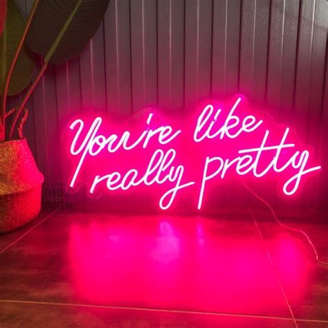 A Neon Sign That Says You Re Like Really Pretty