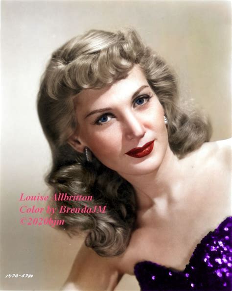 An Old Photo Of A Woman With Long Hair Wearing A Purple Sequin Dress