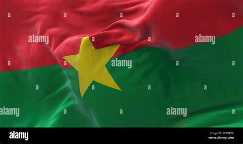 Close Up View Of The Burkina Faso National Flag Waving In The Wind