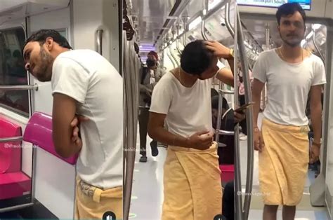 Delhi Metro दिल्ली मेट्रो में तौलिया पहने एक शख्स नजर आया। देखें वायरल