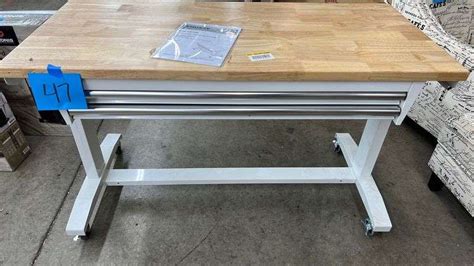 HUSKY 52" ADJUSTABLE HEIGHT WORK TABLE - Earl's Auction Company