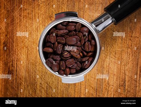 Grinder and filter for the coffee making Stock Photo - Alamy