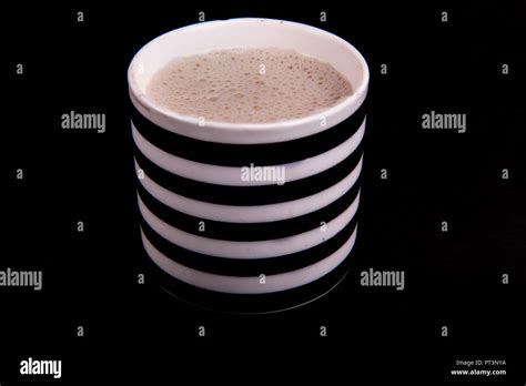 Coffee In Black And White Cup On Dark Background At Mumbai India Stock