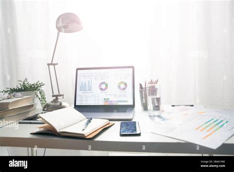 The desk of office supplies Stock Photo - Alamy