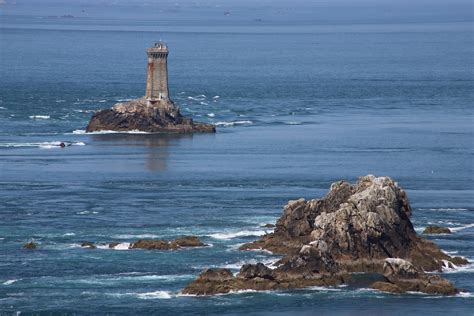 A Lighthouse on a Cape · Free Stock Photo