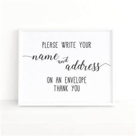 A Black And White Sign That Says Please Write Your Name And Address On