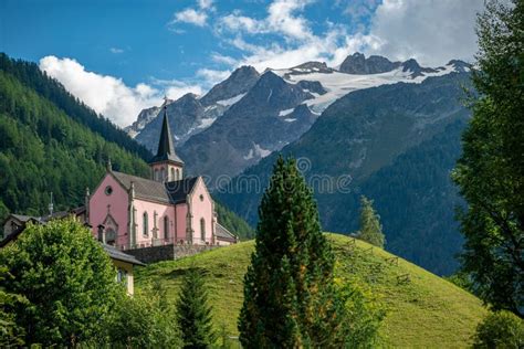 The Trient Eglise Rose Church In The Swiss Alps With A Green Landscape